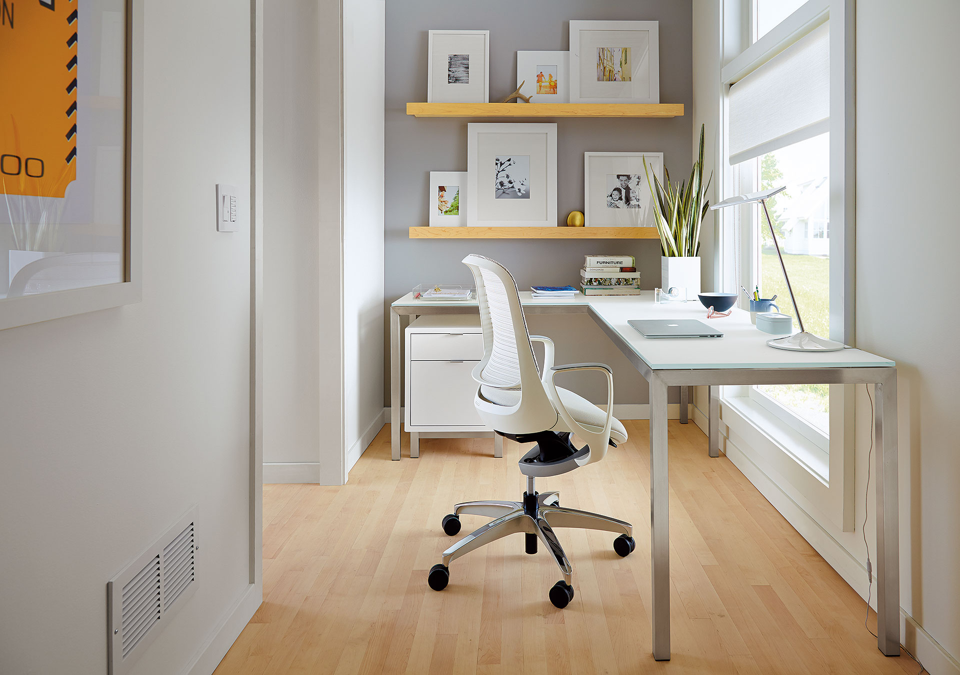 hallway office with l-shaped desk in modern white