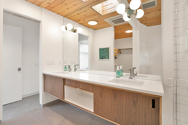 Modern double sink bathroom vanity with Dutton Brown sconces