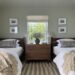 Grove twin beds and dresser in bedroom.