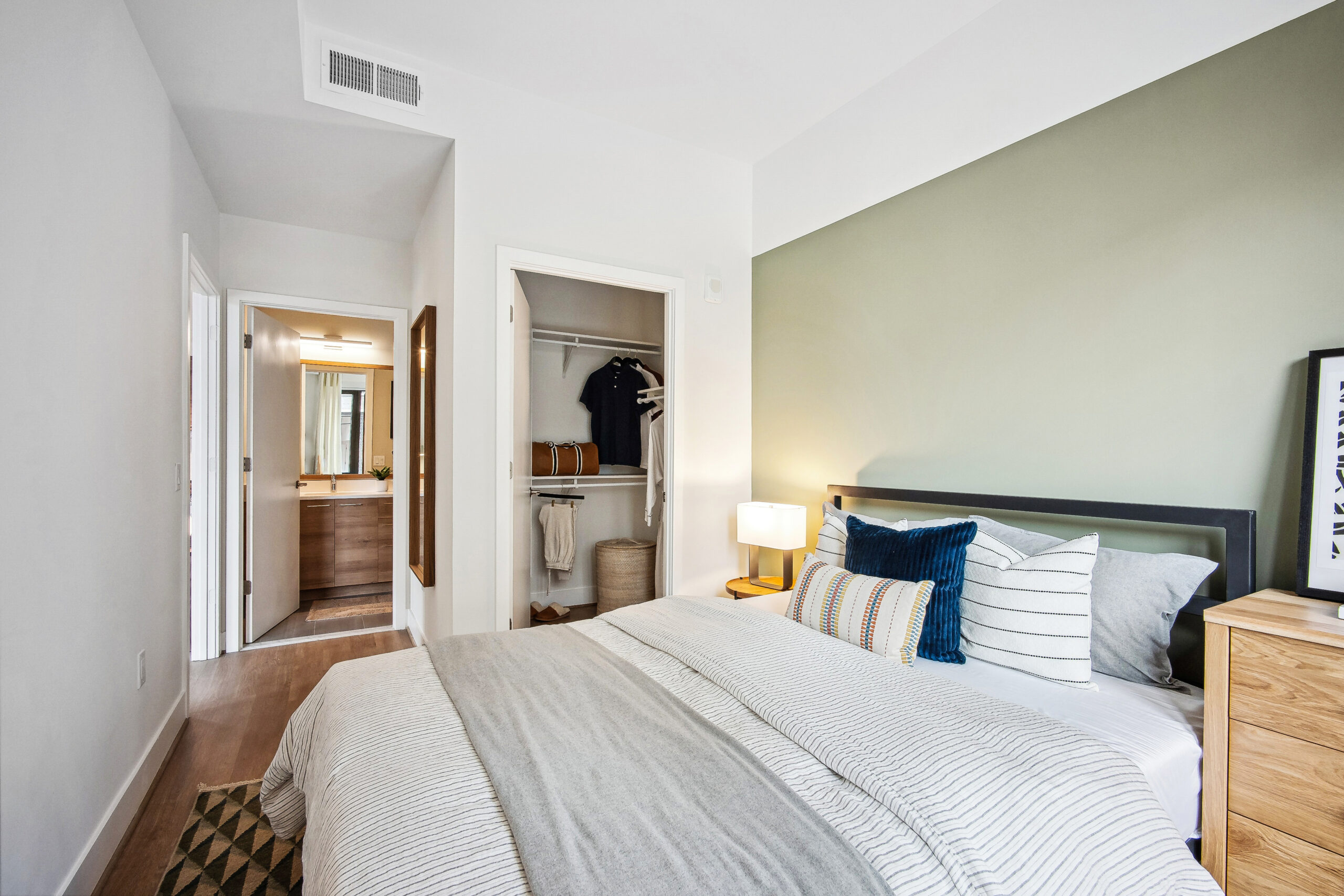 REVA bedroom with Parsons bed., Emerson dressers, Duo table lamp and Plaza rug.