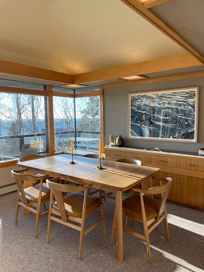 Colby table with Evan chairs in dining room overlooking Lake Superior