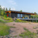 Small modern cabin exterior.